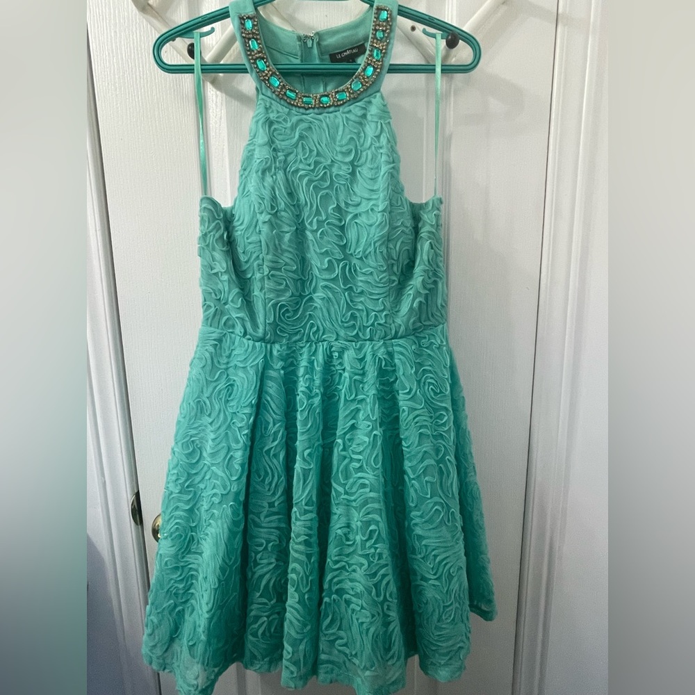 Mint green dress with jewel collar.